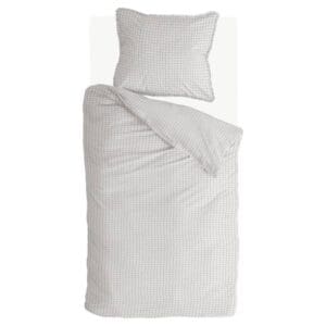 Geruit dekbedovertrek met kussen opgemaakt op bed