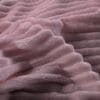Zachte roze pluche stof, close-up textuur