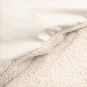 Zachte fleece deken, close-up van textuur en stof.